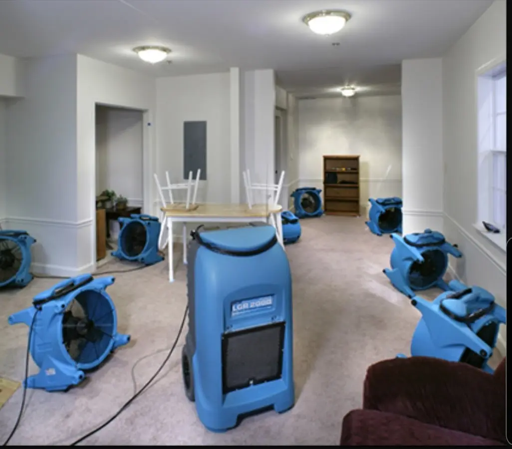 Air movers and dehumidifier setup for Water Damage Restoration in Duncan